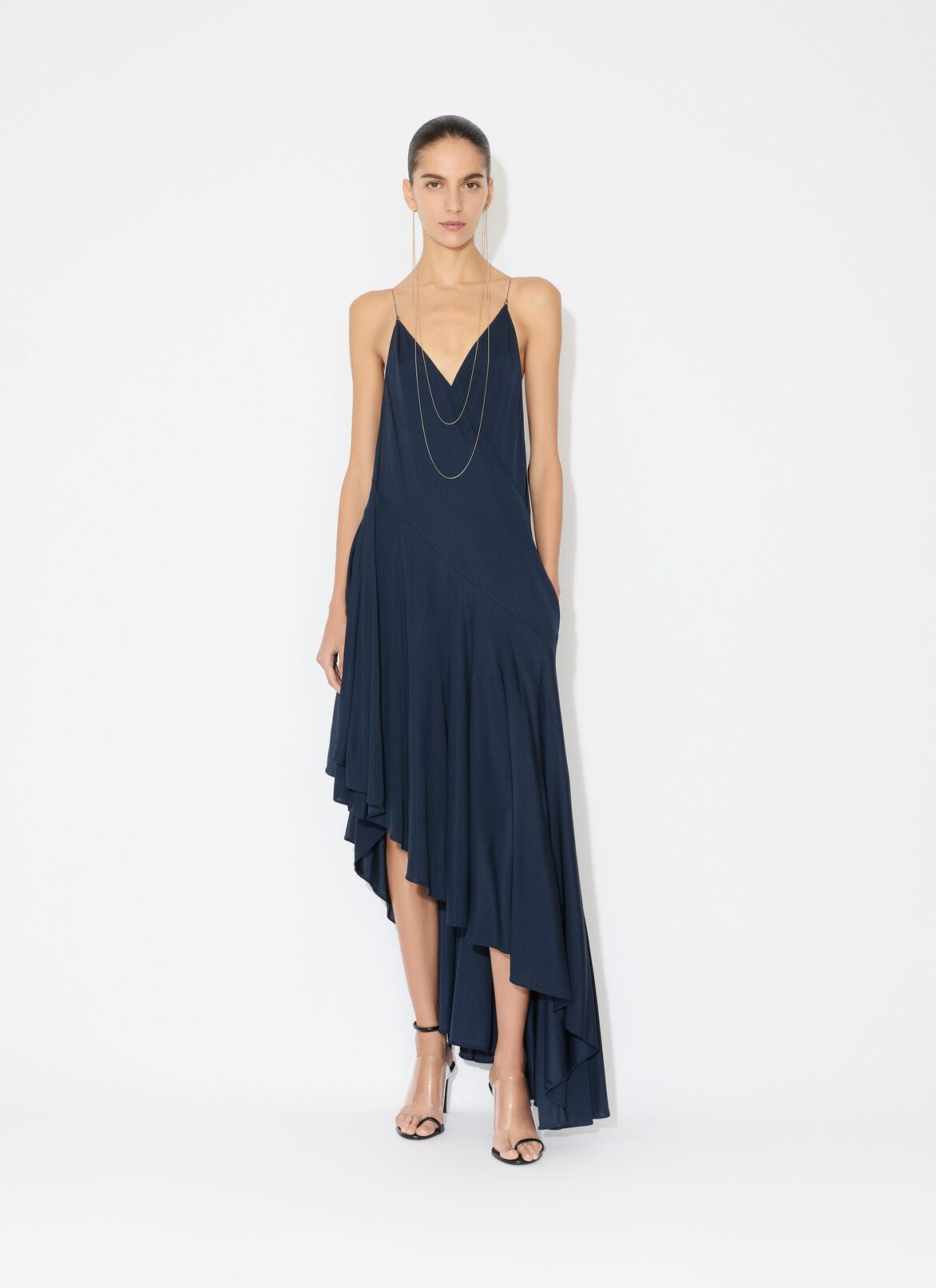 ROBE ASYMÉTRIQUE EN JERSEY MAT ALAÏA ROBE ASYMÉTRIQUE EN JERSEY MAT BLEU FONCÉ